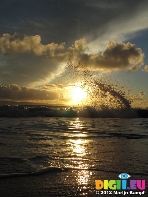 SX25369 Big spray of wave over sunset